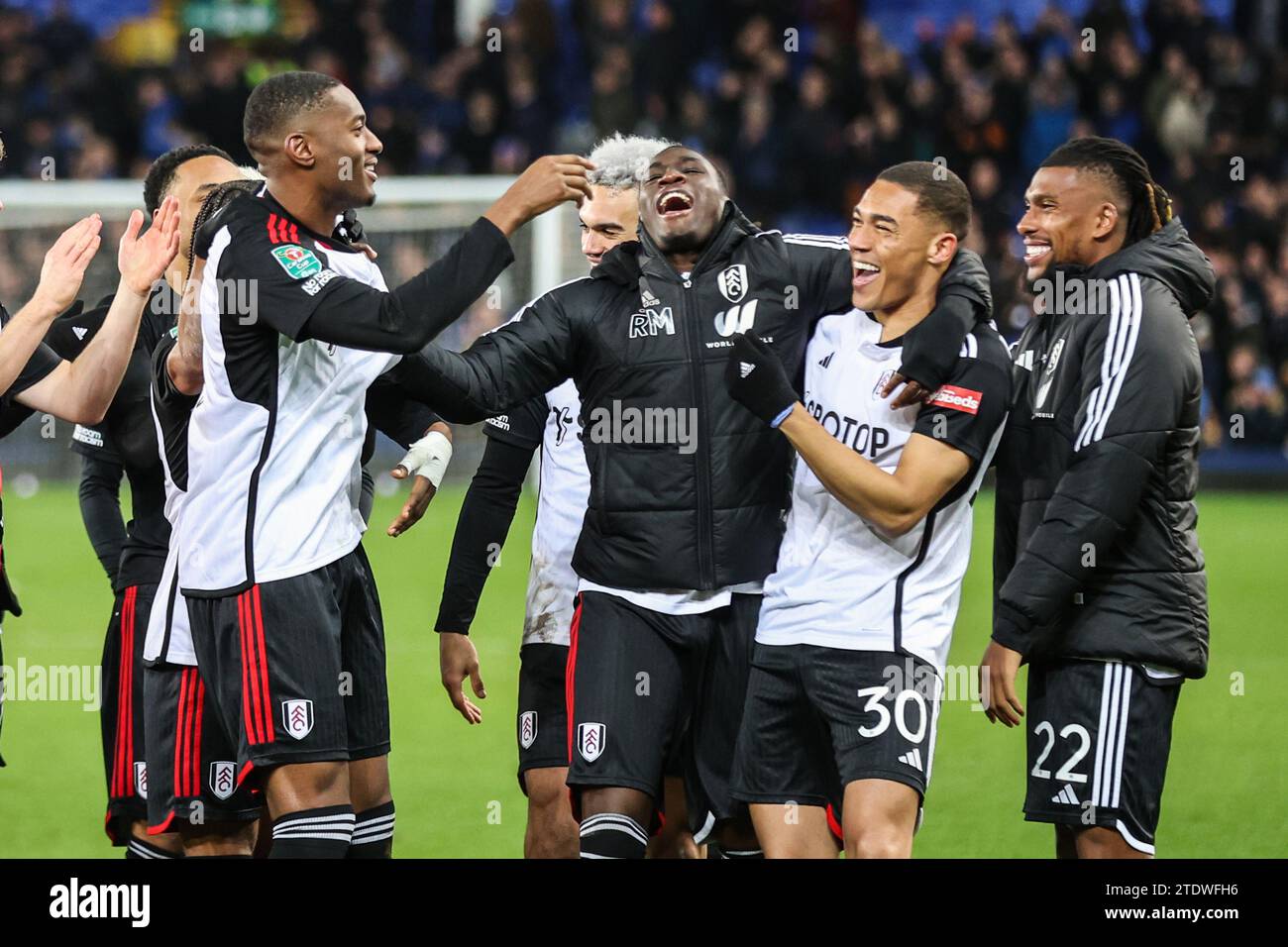 Liverpool, UK. 19th Dec, 2023. Tosin Adarabioyo of Fulham celebrates scoring the winning penalty with team mates during the Everton FC v Fulham FC Carabao Cup Quarter-Final match at Goodison Park, Liverpool, England, United Kingdom on 19 December 2023 Credit: Every Second Media/Alamy Live News Stock Photo