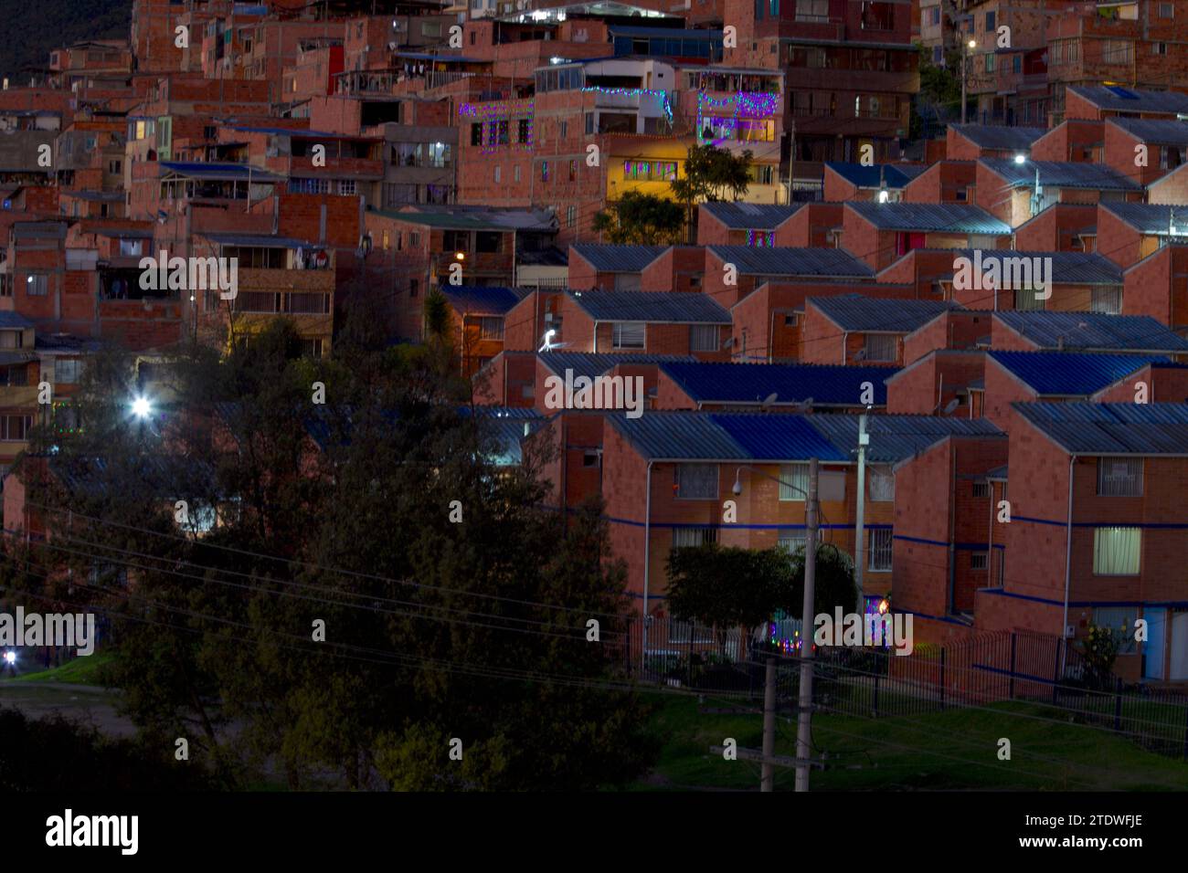 BOGOTA-COLOMBIA-11-12-2023. Some of brick houses and apartments  are seen in a neighborhood north. Photo: Jose Bula Stock Photo
