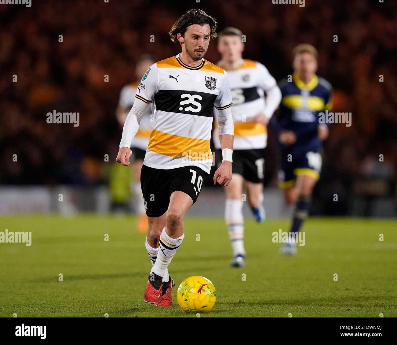 Burslem, UK. 19th Dec, 2023. Ethan Chislett of Port Vale during the Carabao Cup match at Vale Park, Burslem. Picture credit should read: Andrew Yates/Sportimage Credit: Sportimage Ltd/Alamy Live News Stock Photo