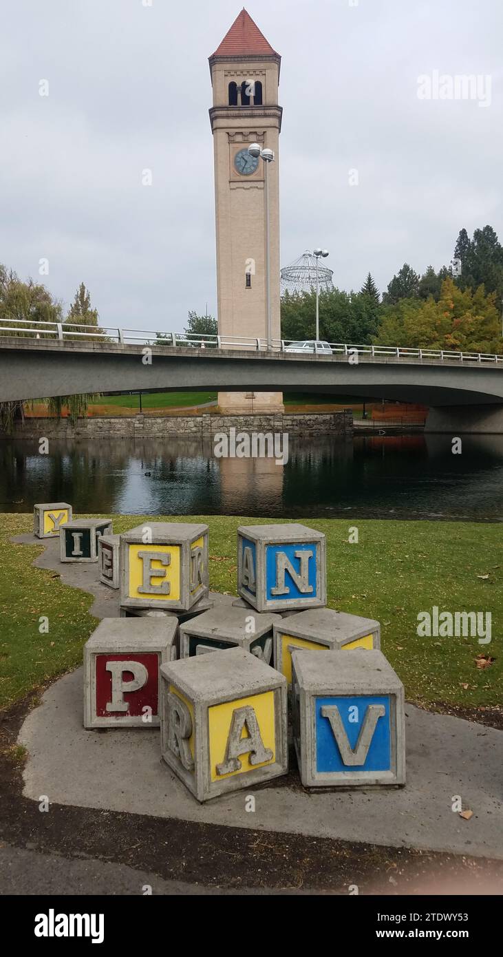 Riverfront in Spokane during autumn with clocktower in the distance Stock Photo