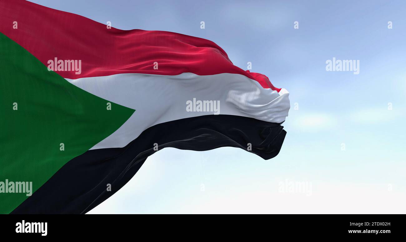 Close-up of Sudan national flag waving in the wind. Red, white, black horizontal stripes with a green triangle at the hoist. 3d illustration render. R Stock Photo