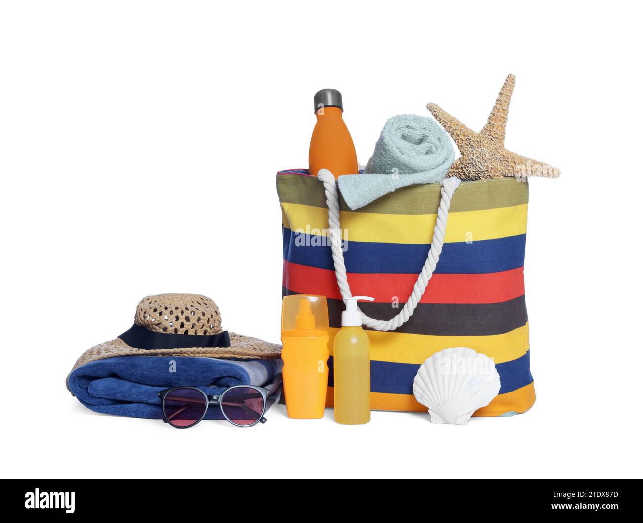 Stylish bag, starfish and other beach accessories isolated on white Stock Photo