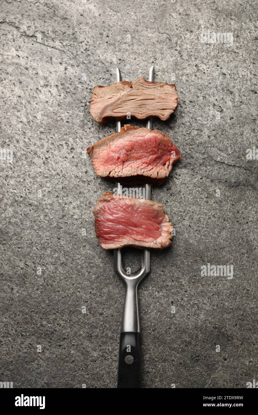 Delicious sliced beef tenderloin with different degrees of doneness on