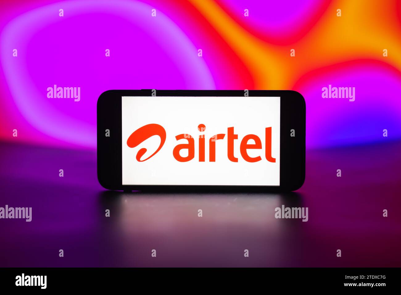 India. 19th Dec, 2023. In this photo illustration, the Airtel logo is seen displayed on a mobile phone screen. Credit: SOPA Images Limited/Alamy Live News Stock Photo