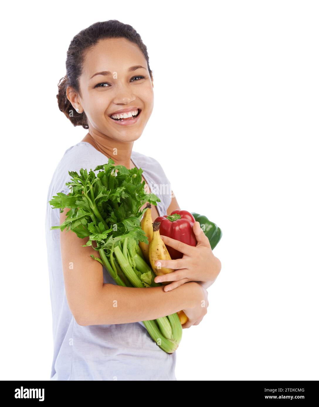 Vegetables, grocery shopping and happy woman in studio for healthy food, sustainability or diet. Portrait of vegan customer or model with fruits for Stock Photo