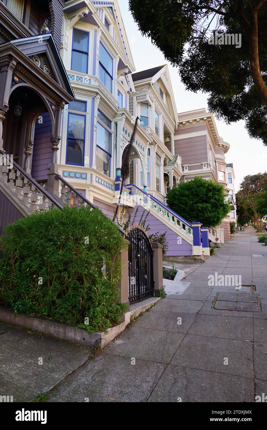 San Francisco, California, USA. The 700 block of Ashbury Street with its steeply sloped sidewalk. At far left is the the 'Grateful Dead House.' Stock Photo