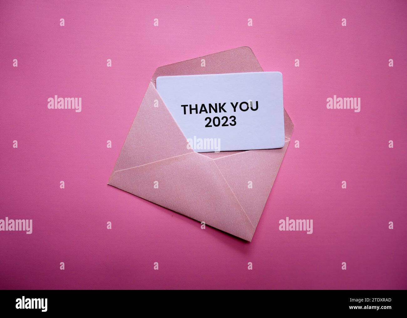 Thank you 2023 card in a white envelope with color background. byebye