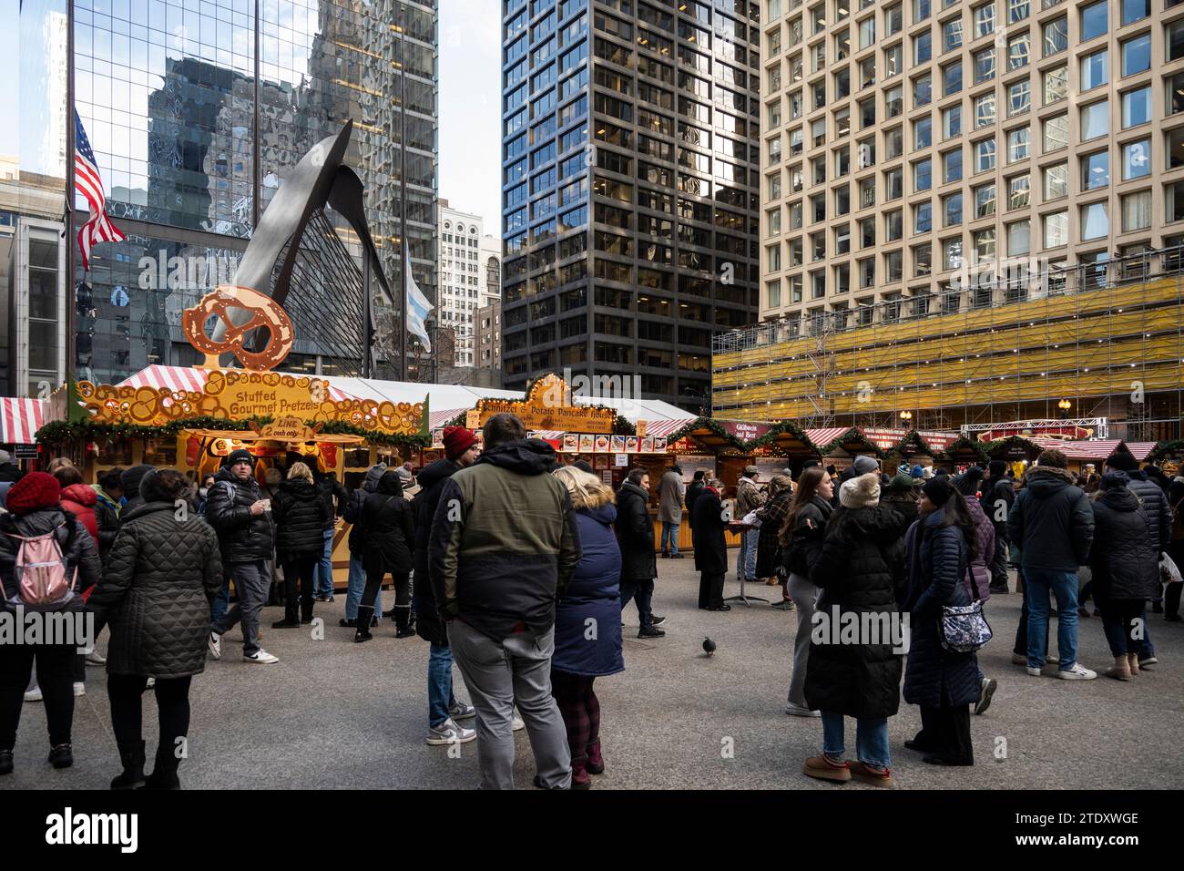 Chicago, USA. 19 December 2023. Tourists and locals visit the popular