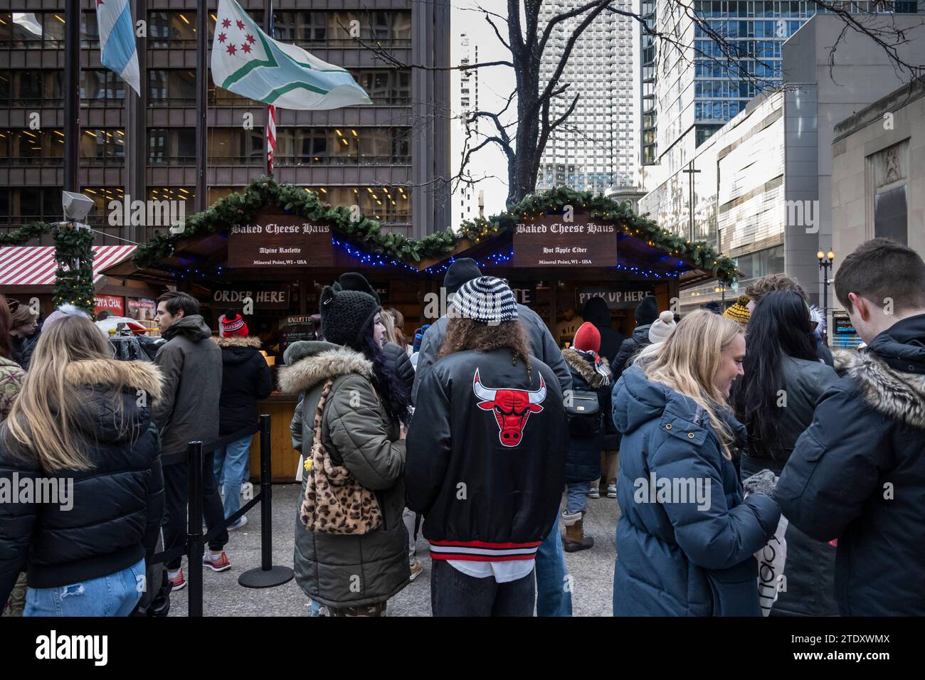 Chicago, USA. 19 December 2023. Tourists and locals visit the popular