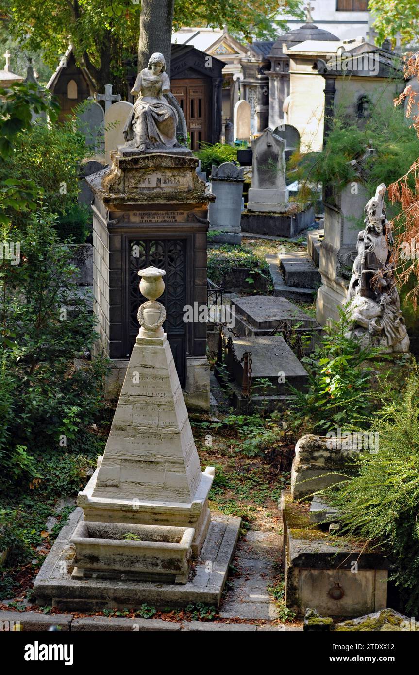 Graves and monuments in Paris' historic Père Lachaise Cemetery, a popular destination for tourists. Stock Photo