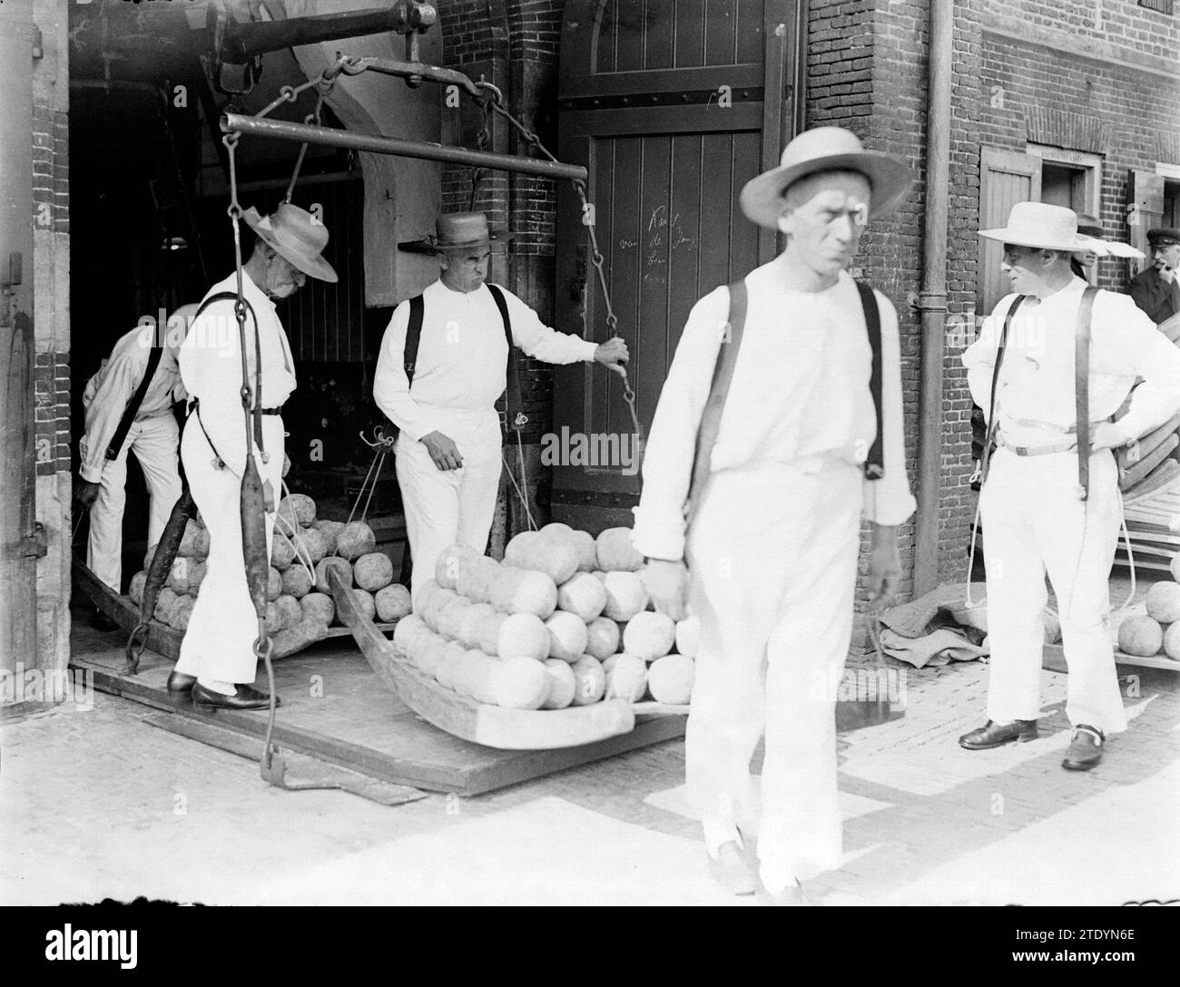 The cheese market in Alkmaar two carriers with scales ca. 1932 Stock