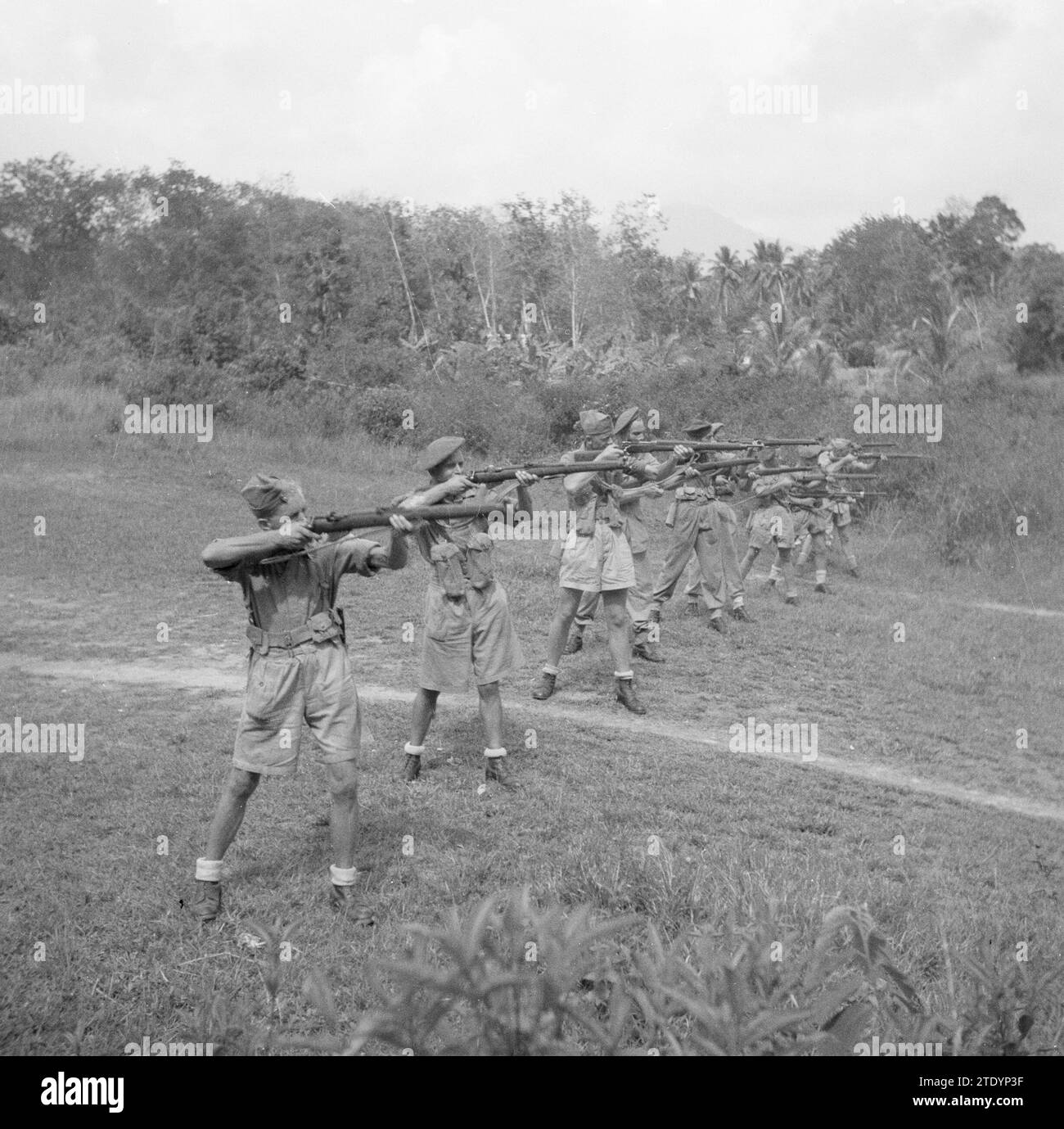 Military exercise in Chaah, soldiers shooting rifles ca. March 1946 Stock Photo