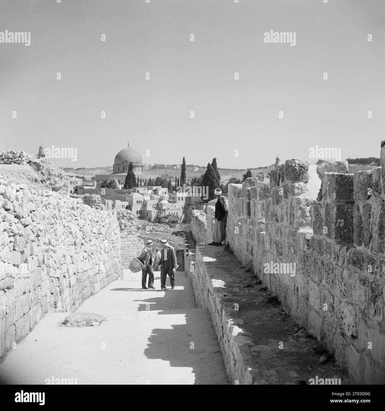 Street in Jewish Quarter. Al Aqsa mosque in the distance ca. 1950-1955 Stock Photo