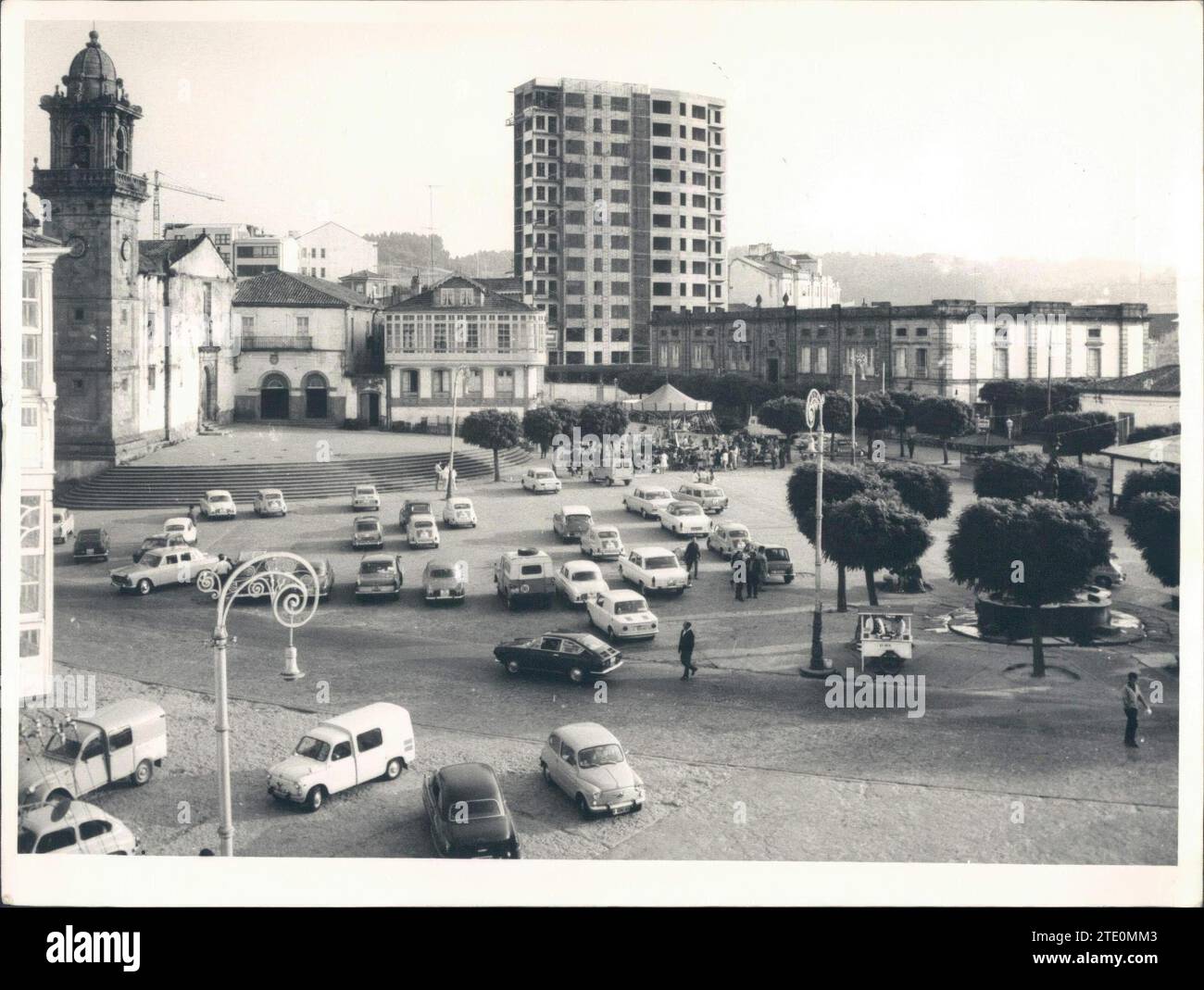 12/31/1967. Plaza del Campo Also known as the García Naveira Brothers. We see on the left, the Baroque tower (17th century) of Santo Domingo, on the right, the neoclassical style palace built in the 18th century and whose function was to archive the kingdom of Galicia. The urban center is provided with three Gothic Churches with Romanesque features: Santiago, San Francisco and Santa María del Azogue. Next to these, the convent of Agustinas Recoletas (17th century), the Town Hall (18th century) designed by Ventura Rodríguez, the Huérfanas school. Credit: Album / Archivo ABC / Foto Blanco Stock Photo