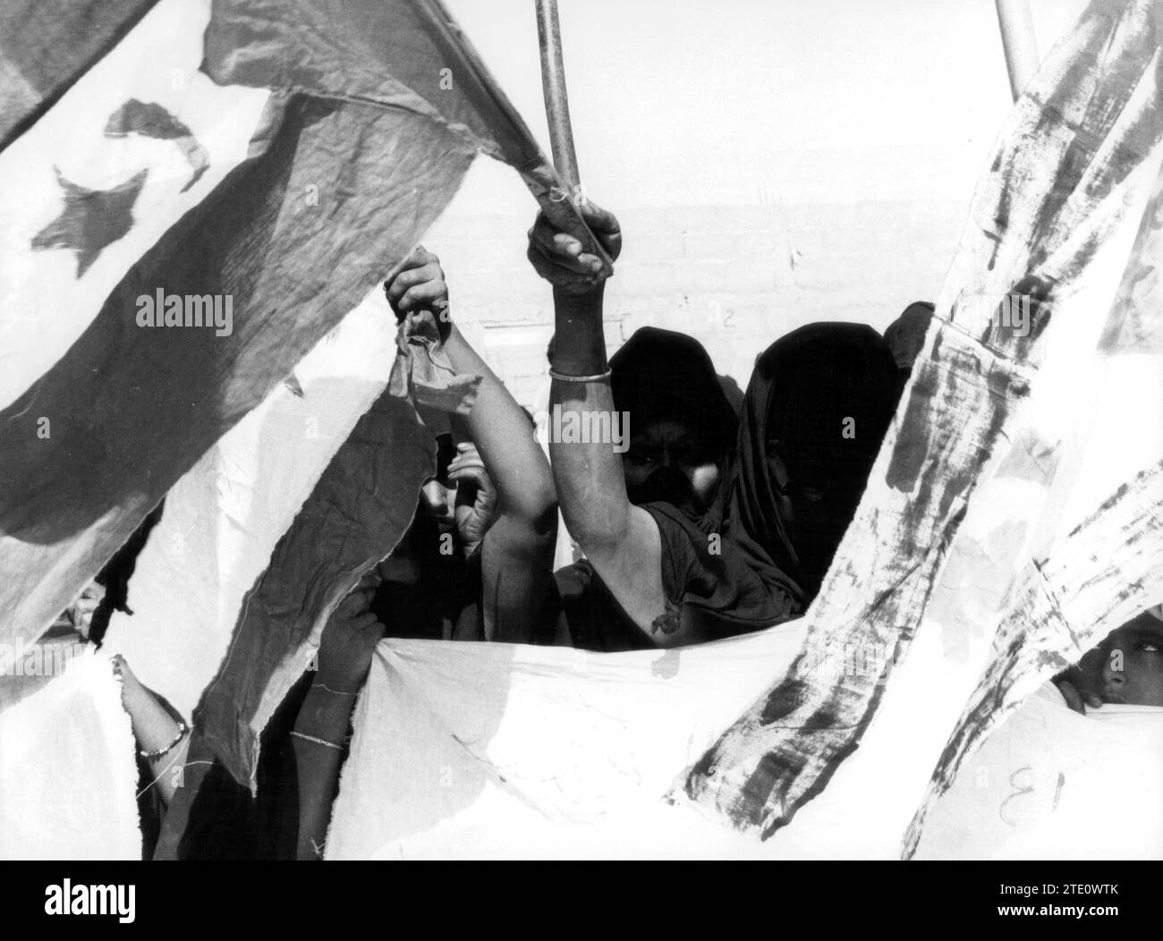 08/17/1975. Demonstration of the Polisario Front Hooded People Carrying their Flags in Aaiun. Credit: Album / Archivo ABC Stock Photo