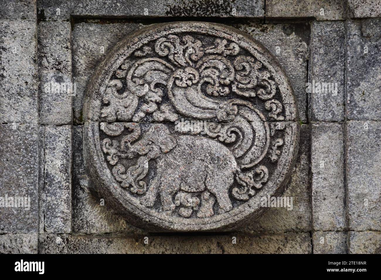 medallion in the penataran temple with animal reliefs. Stock Photo