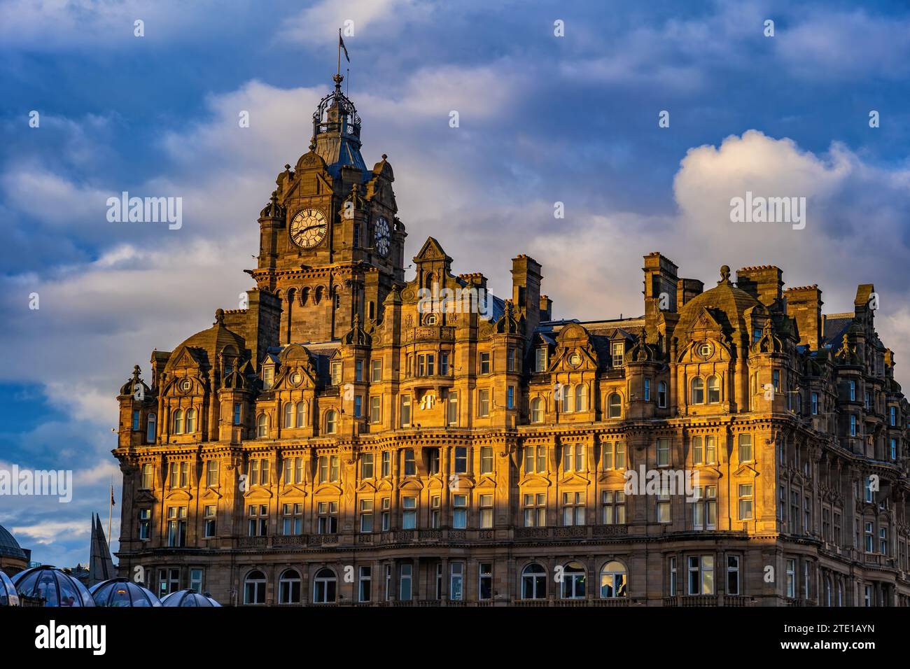 The Balmoral Hotel at sunset in city of Edinburgh in Scotland, UK. Five star hotel luxury accommodation at Princes Street, Rocco Forte Hotels group. Stock Photo