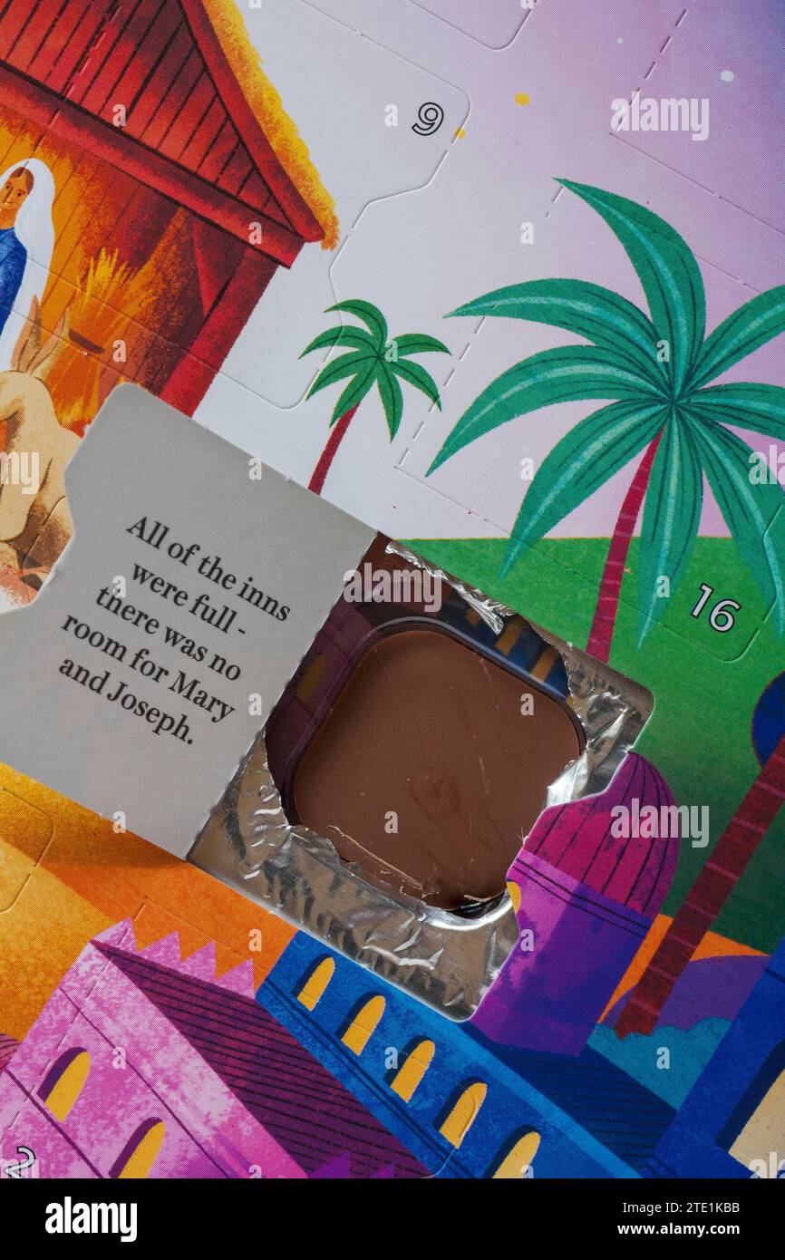 Open door on nativity advent calendar showing chocolate and part of the nativity story Stock Photo