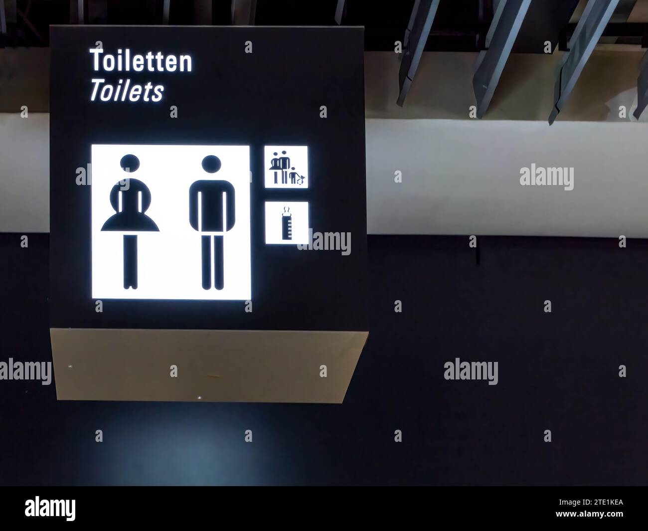 Frankfurt, Germany - June 7, 2023 - black display with a pictogram and the text 'Toiletten' and 'toilets' Stock Photo