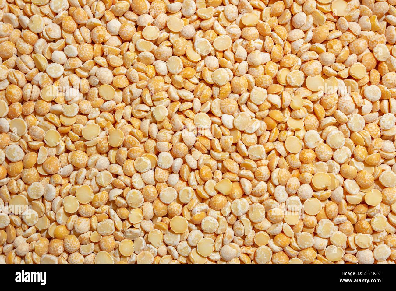 Uncooked Polished Split Peas Background. A Culinary Canvas of Dry
