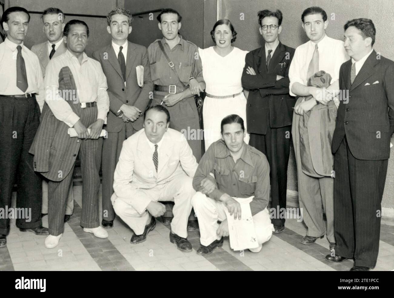 Valencia, July 1937. Attendees at the Congress of Anti-Fascist Writers of Valencia, among whom are Pablo Neruda (crouching, on the left of the image), César Vallejo and Nicolás Guillén (first and third from the left). Credit: Album / Archivo ABC Stock Photo