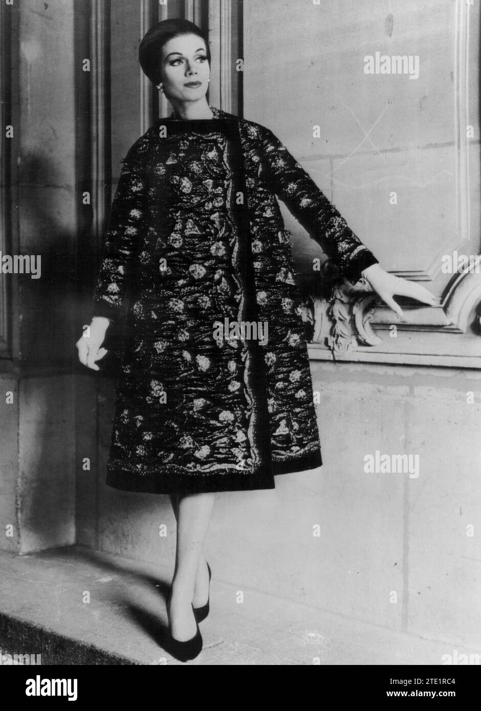 08/28/1961. In the Image, 'Dioríssimo': model Created by Marc Bohan. Short evening set. Suit and coat in gray Foncé velvet, embroidered in silver by Reve. Shoes creation of Roger Vivier. Credit: Album / Archivo ABC / Verroust Stock Photo