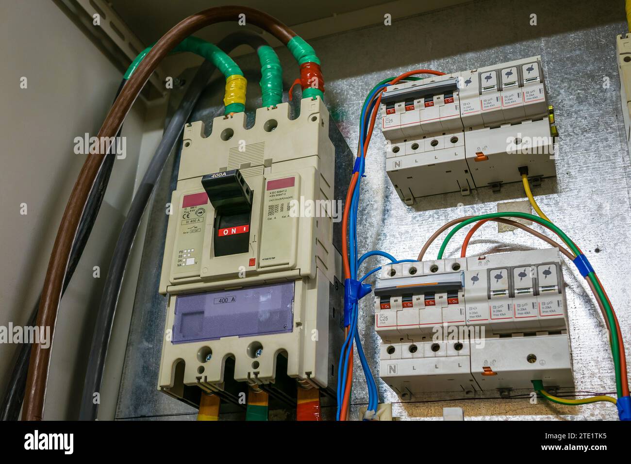 Three-phase 400 ampere circuit breaker in a metal wiring box Stock Photo