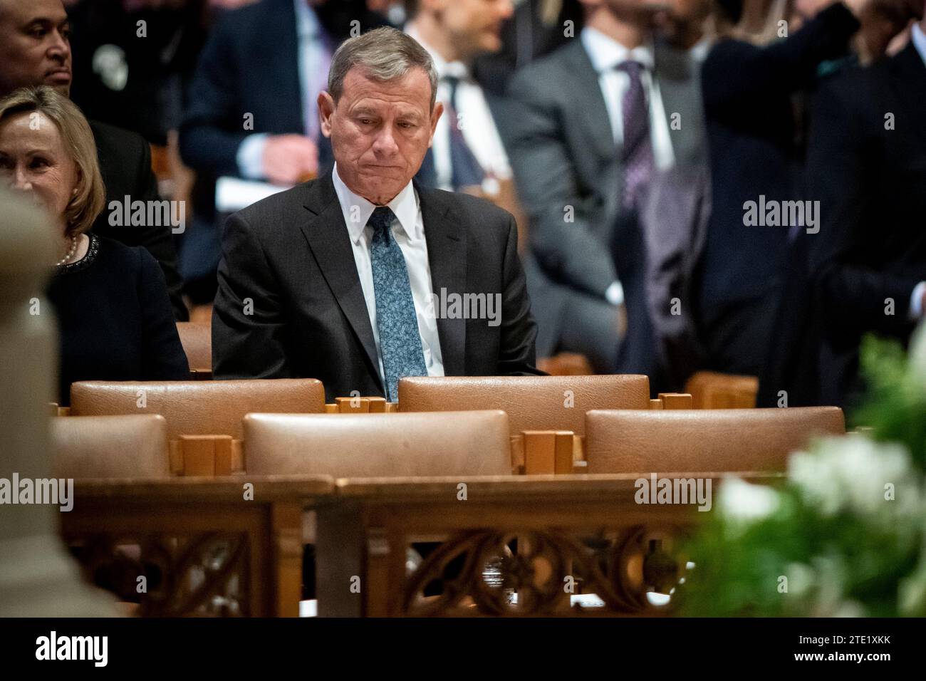 Chief Justice of the United States John G. Roberts, Jr., takes his seat