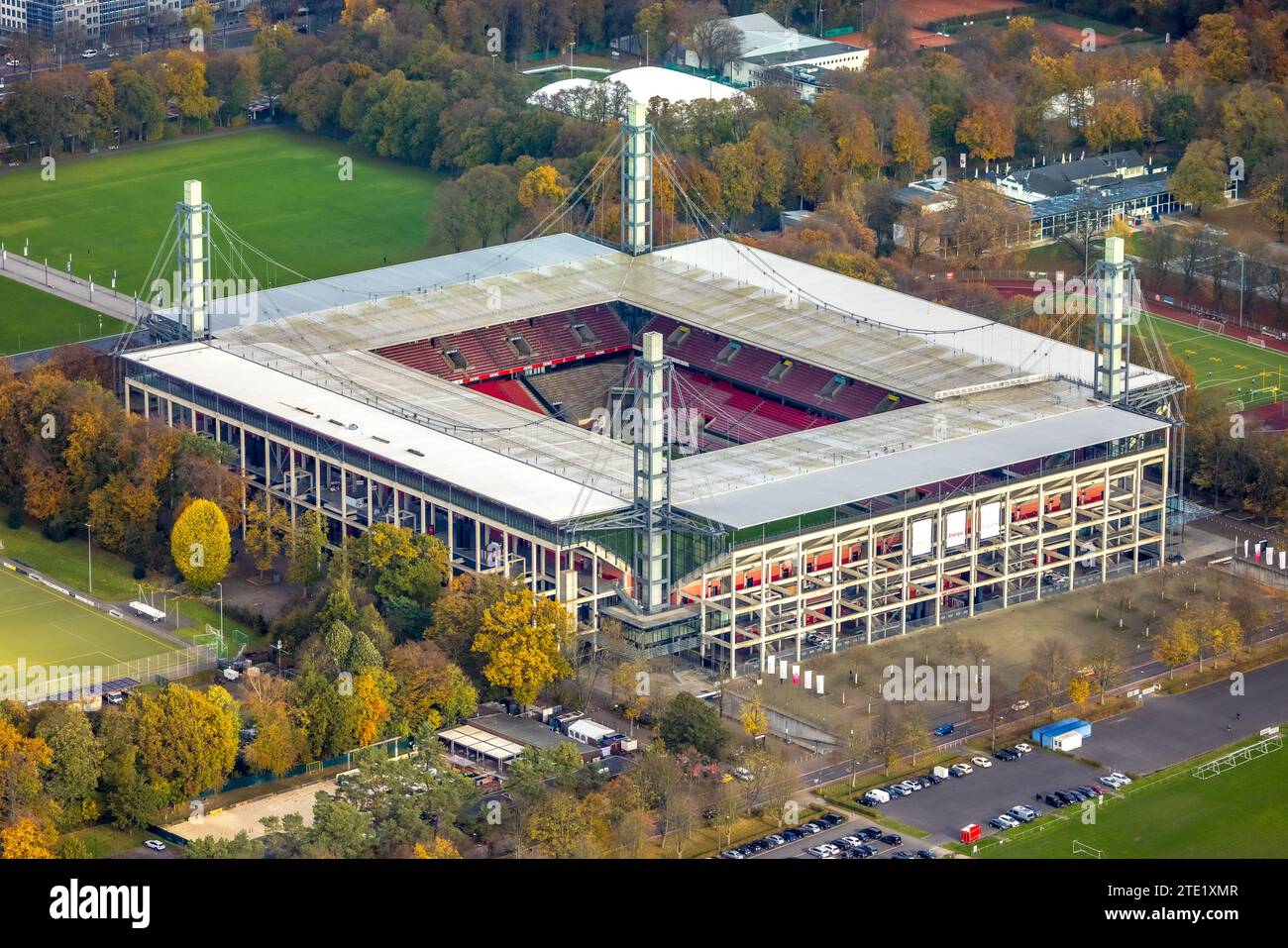 Aerial view, Bundesliga stadium RheinEnergieStadion of 1. FC Köln, formerly Müngersdorfer Stadion soccer pitch and training grounds surrounded by autu Stock Photo