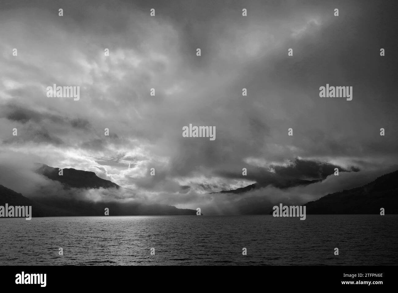 A misty dawn over Loch Lomond from Duck Bay, Balloch village, West