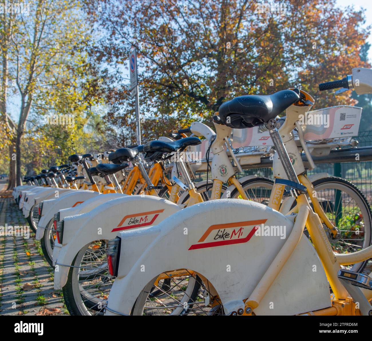 Milan Italy December 6 2023:Bike parking provided for sharing Stock Photo