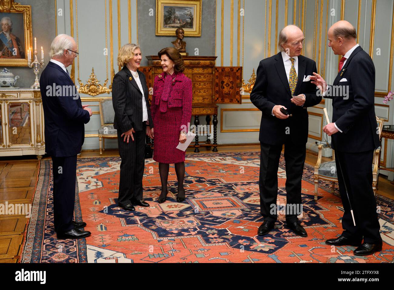 STOCKHOLM 20231220King Carl Gustaf, Queen Silvia, Kerstin Falkenberg and Henrik Falkenberg when they give Queen Silvia a gift at Stockholm Palace on the occasion of the Queen's upcoming 80th birthday. Photo: Jessica Gow/TT/Code 10070 Credit: TT News Agency/Alamy Live News Stock Photo