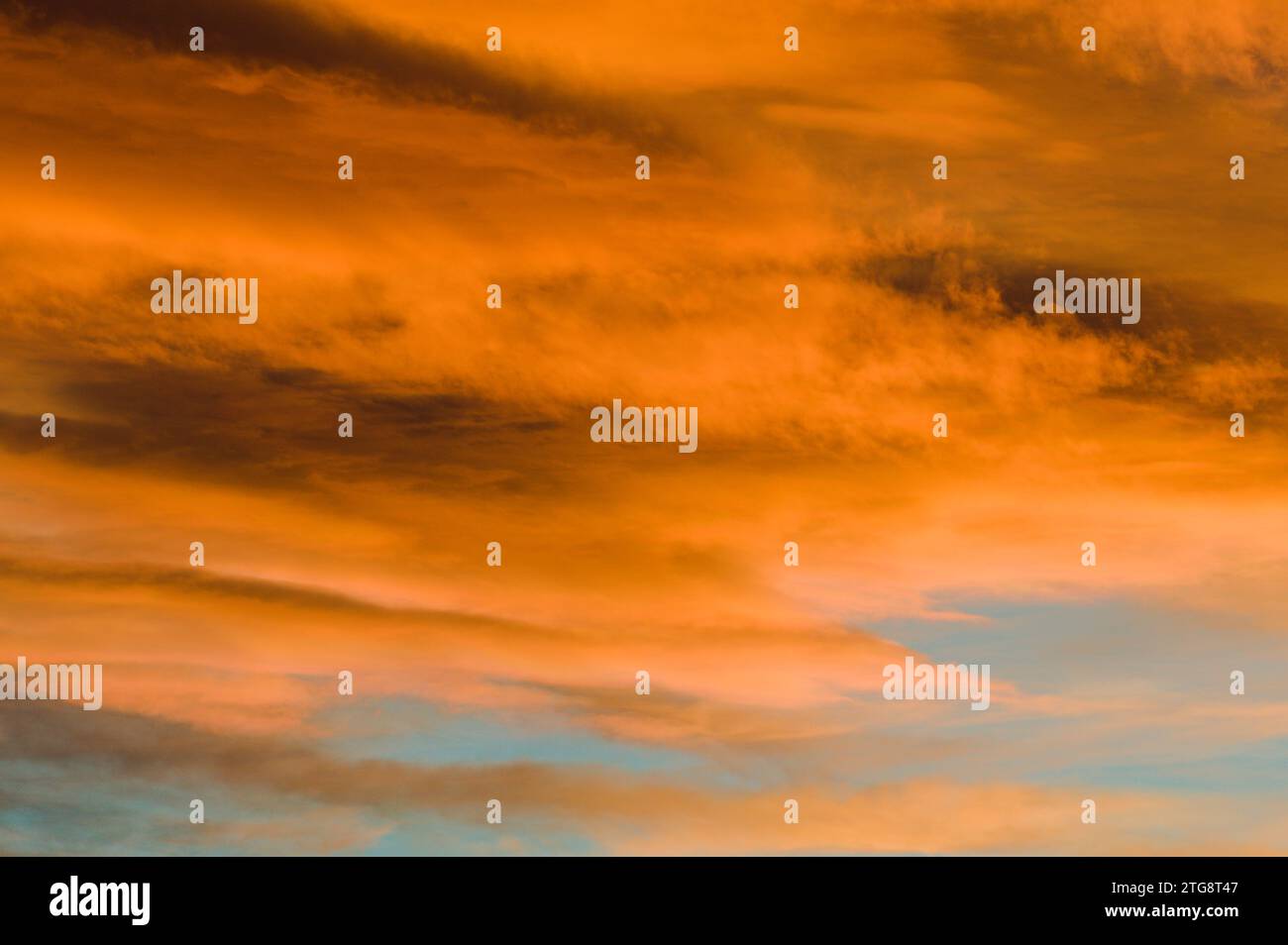 Very dramatic sunset clouds on the sky. Copy space for placement of text. Empty background teplate for designers. Stock Photo