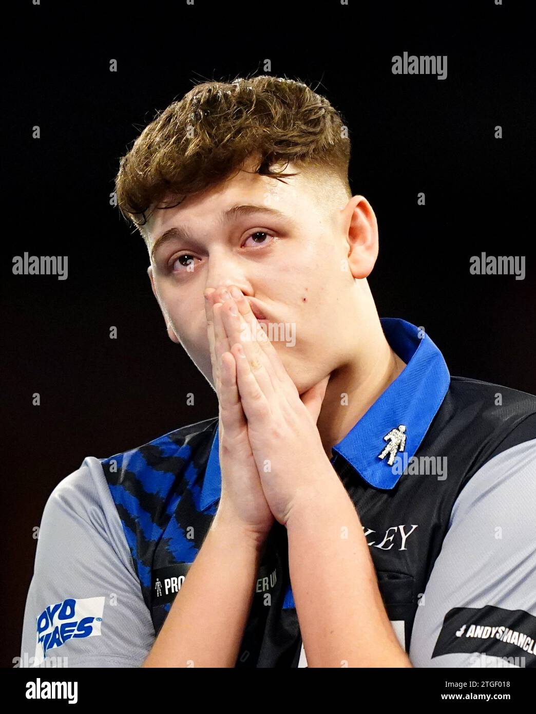 Owen Bates reacts during his match against Steve Lennon (not pictured