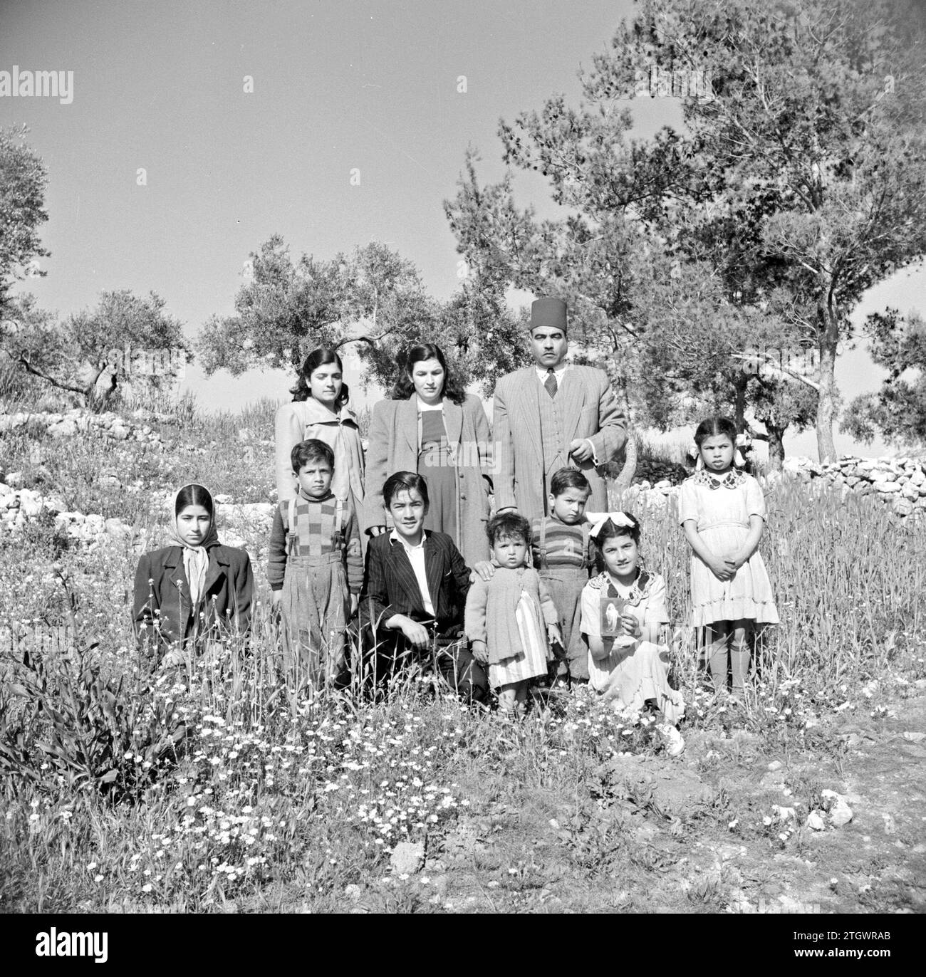 Lebanese family in a garden ca. 1950-1955 Stock Photo