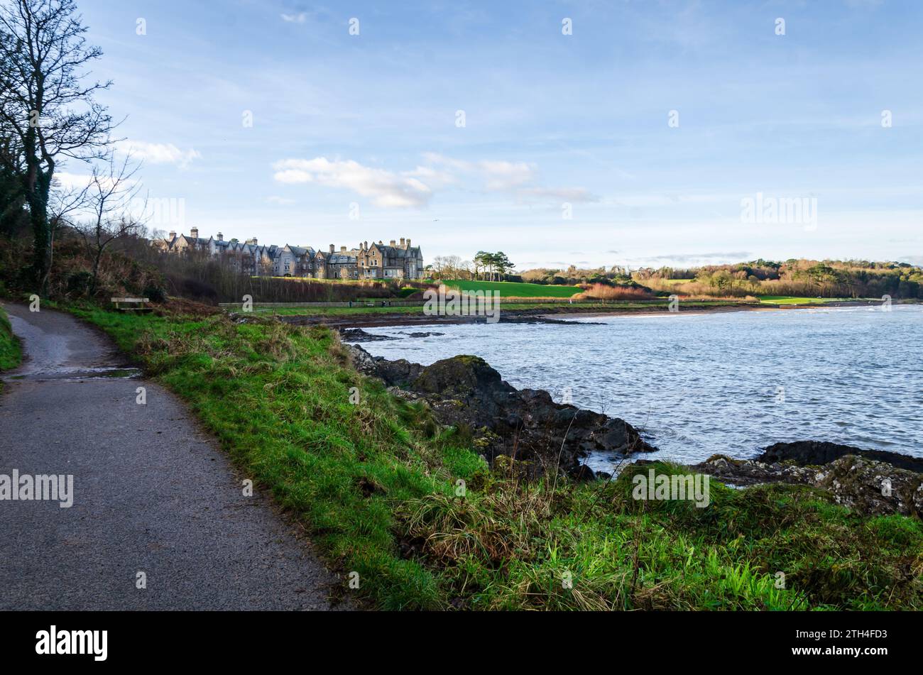 Crawfordsburn, County Down, Northern Ireland December 13 2023 - Crawfordsburn seafront with large country house in the background Stock Photo