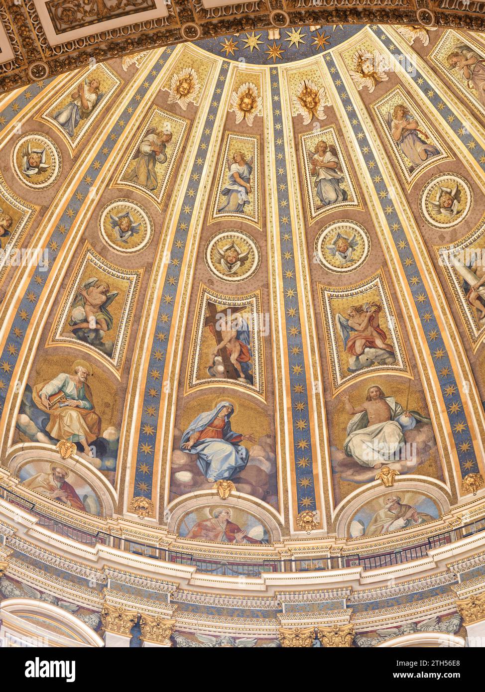 Mosaic illustrations on the underside of the main dome in the basilica of St Peter, Vatican, Rome, Italy. Stock Photo