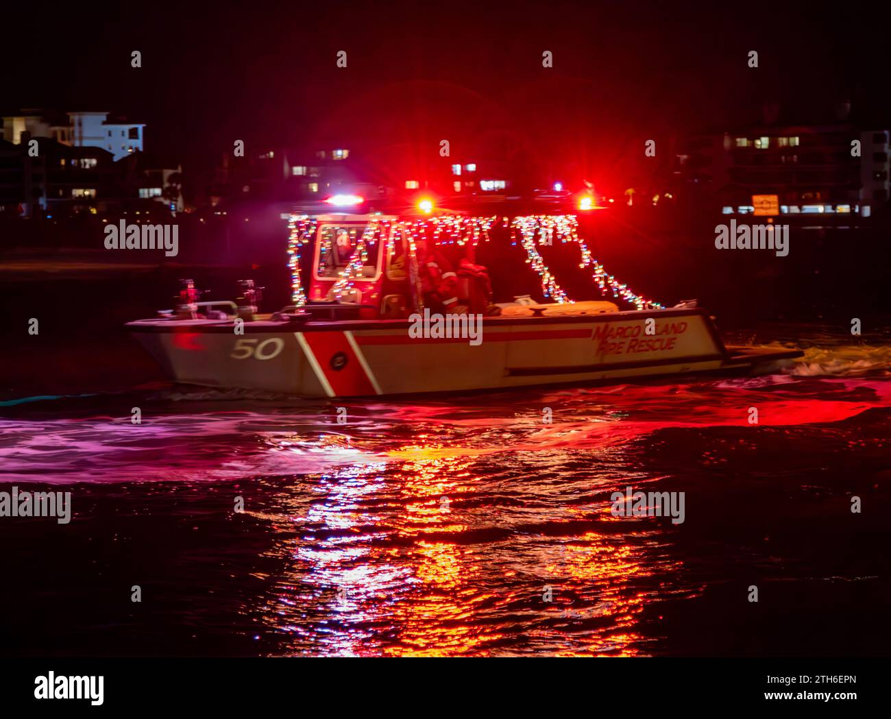 Marco, USA. 20th Dec, 2023. Marco Island Christmas Island Style boat