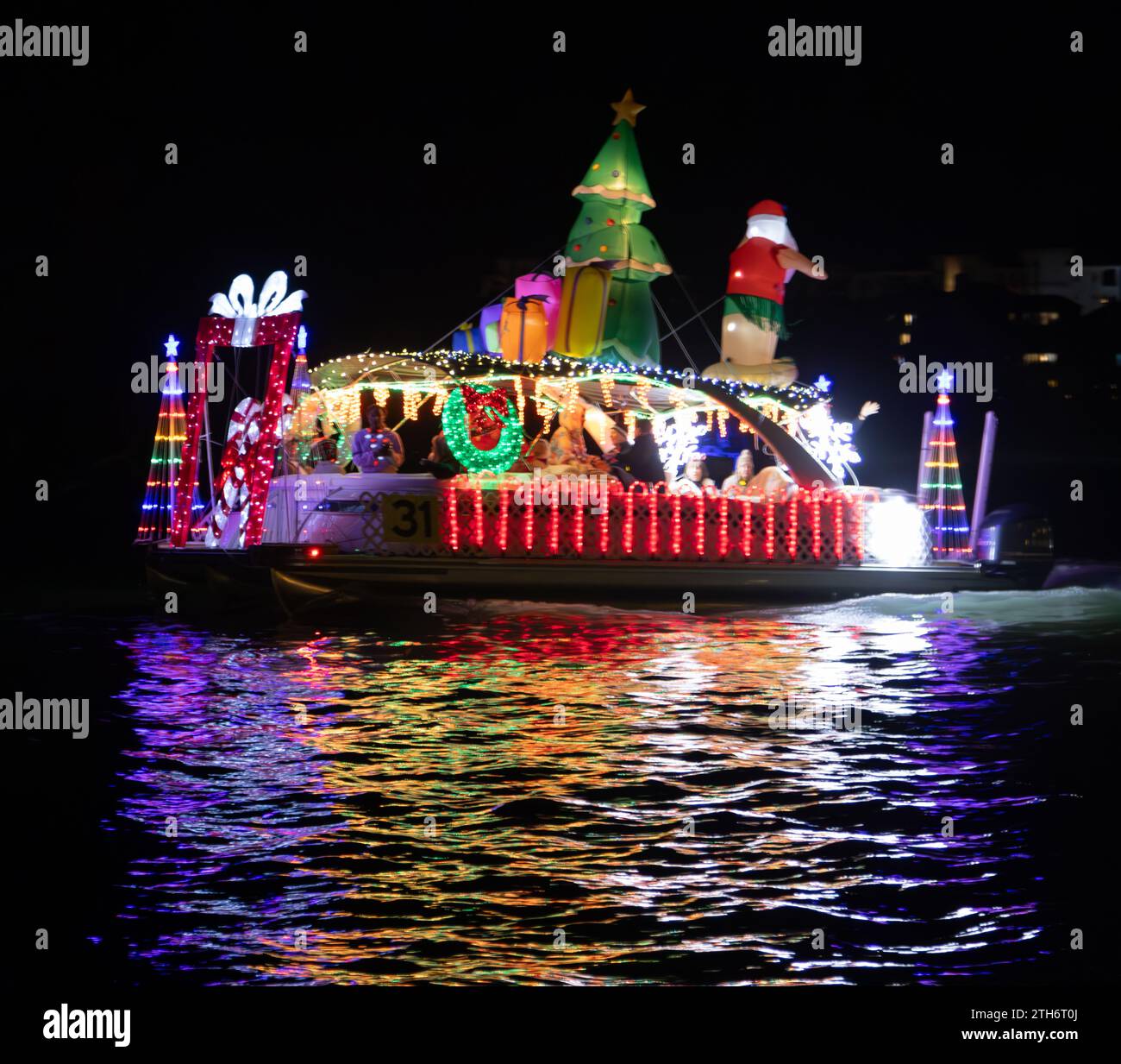 Marco, USA. 20th Dec, 2023. Marco Island Christmas Island Style boat