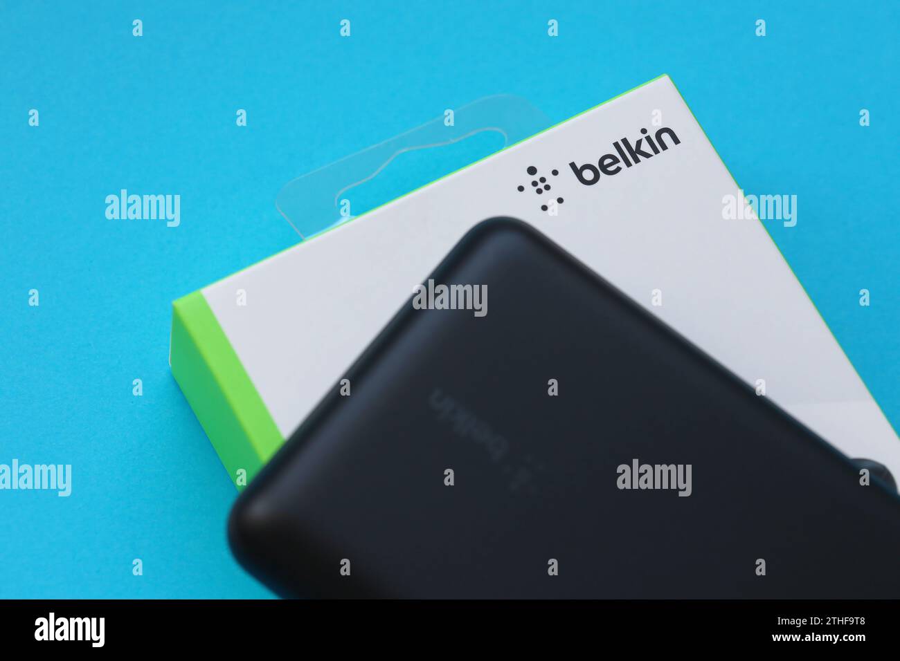 KYIV, UKRAINE - MAY 4, 2022 Portable Powerbank battery with logo of Belkin International, american manufacturer of consumer electronics that specializes in connectivity devices Stock Photo