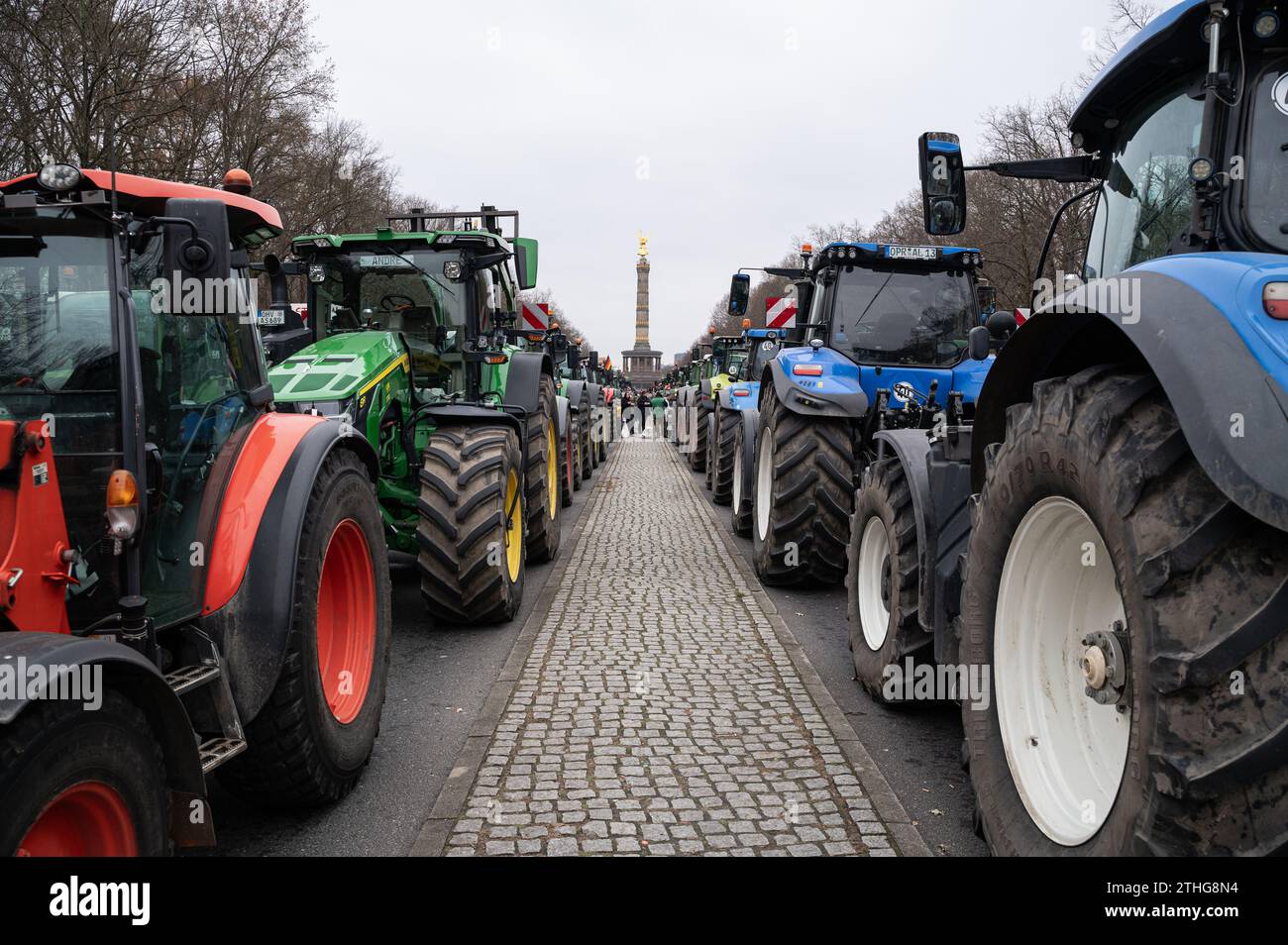 18.12.2023, Berlin, Germany, Europe - Several thousand farmers demonstrate with their tractors in front of the Brandenburg Gate against budget cuts. Stock Photo