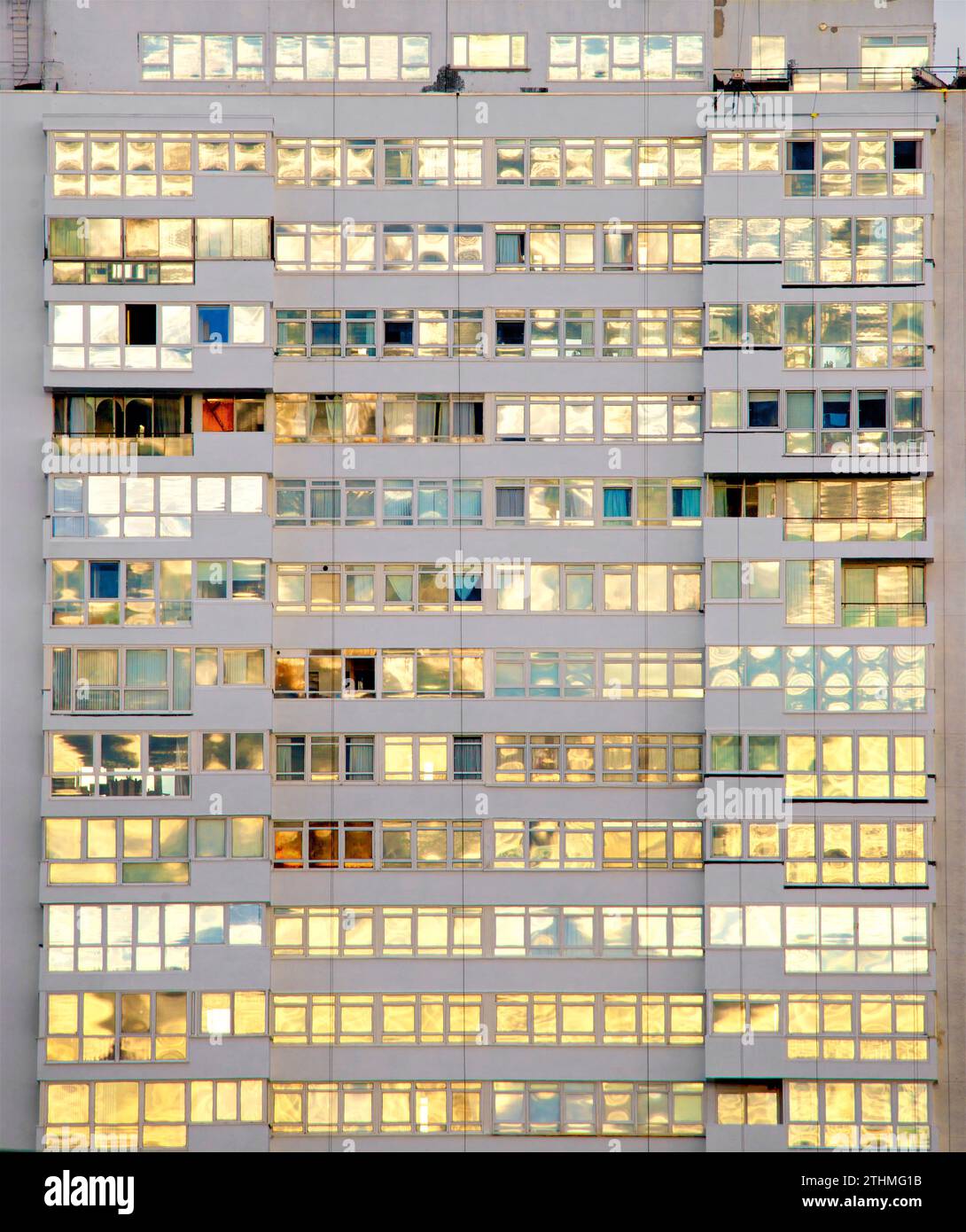 Windows in an apartment building. Sussex Heights, a residential tower block in the centre of Brighton, part of the English city of Brighton and Hove. Built between 1966 and 1968 it rises to 334 feet. Stock Photo