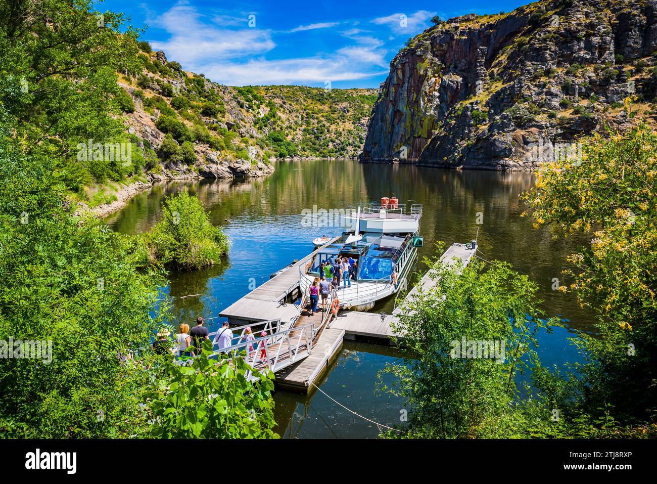 Dock and boat to do the Arribes del Duero Environmental Cruise. Miranda do Douro. Duero River, natural border between Spain and Portugal. Europe Stock Photo