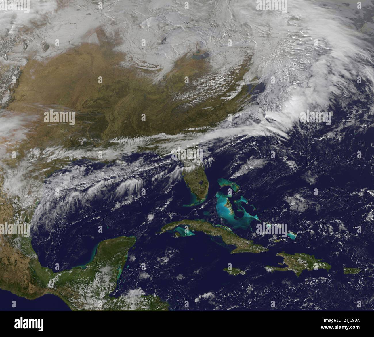 Satellite View of snowstorm for the NE USA with the view here also showing Central America, Cuba and the Caribbean. NOAA's GOES-East satellite provides infrared and visible data of the eastern half of the U.S. At the NASA-NOAA GOES Project, NASA Goddard Space Flight Center, that data is made into visualisations. The NASA-NOAA GOES Project created a visible image of the storm that was already affecting the north-eastern U.S. on 29 December 2016. At that time, the low pressure centre was north of the Great Lakes and was moving east.  An Optimised version of an original NASA image / Credit: NASA Stock Photo