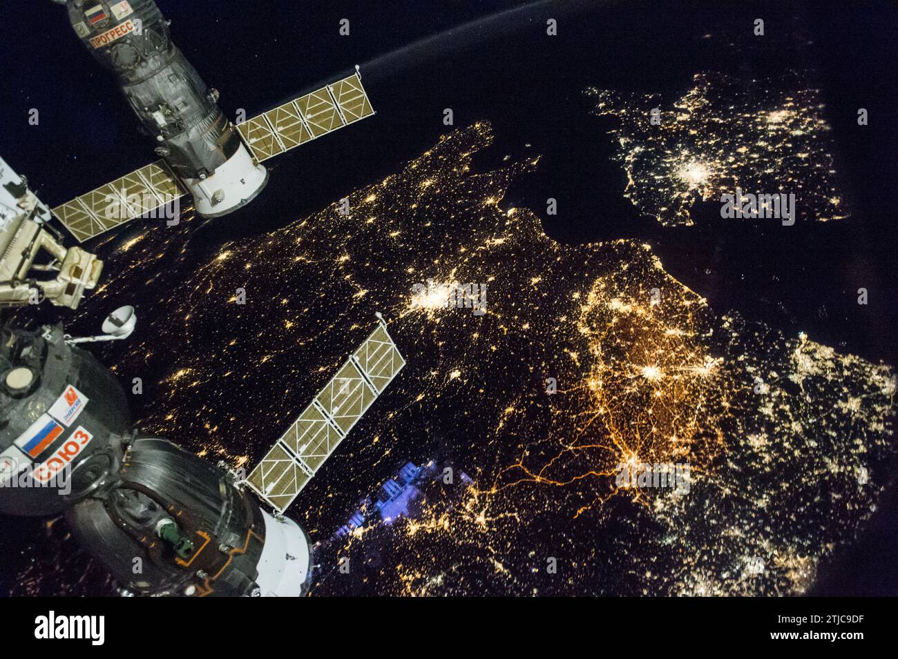 Crew on the International Space Station (ISS) crew capture a view of w estern Europe at night. 28 November 2016. The bright city lights of Paris can be seen  along with areas of Belgium,, the Netherlands  and England (top left).  An Optimised version of an original NASA image / Credit: NASA Stock Photo