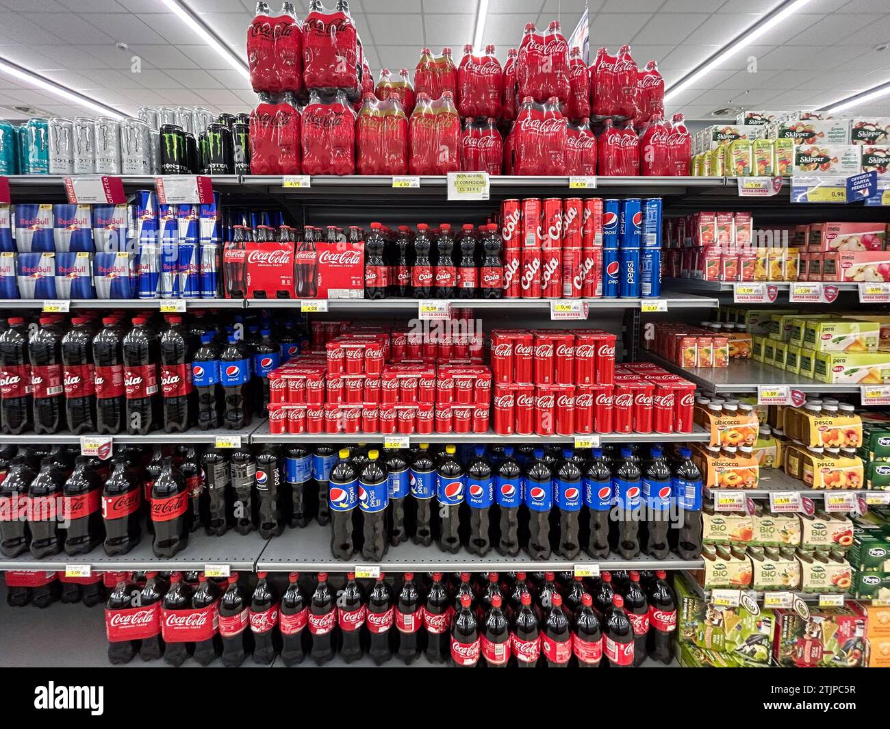 Italy December 19, 2023 Italian supermarket shelf selling bottles