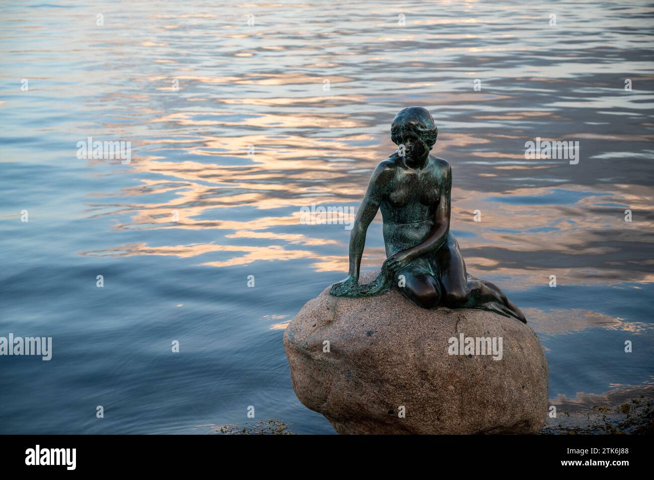 The Little Mermaid Statue at day time in Copenhagen Denmark Stock Photo