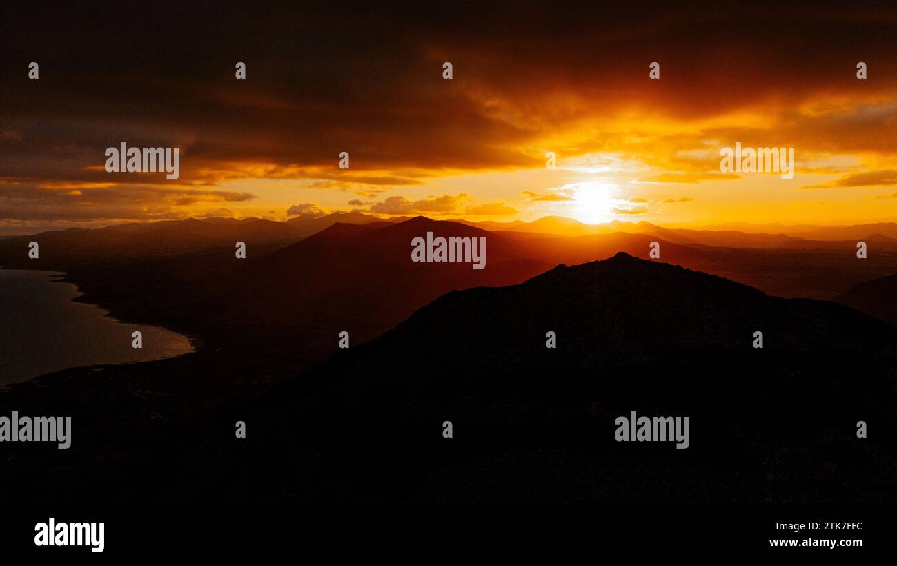 Sunrise over the Snowdonia / Eryri mountain range, Wales Stock Photo