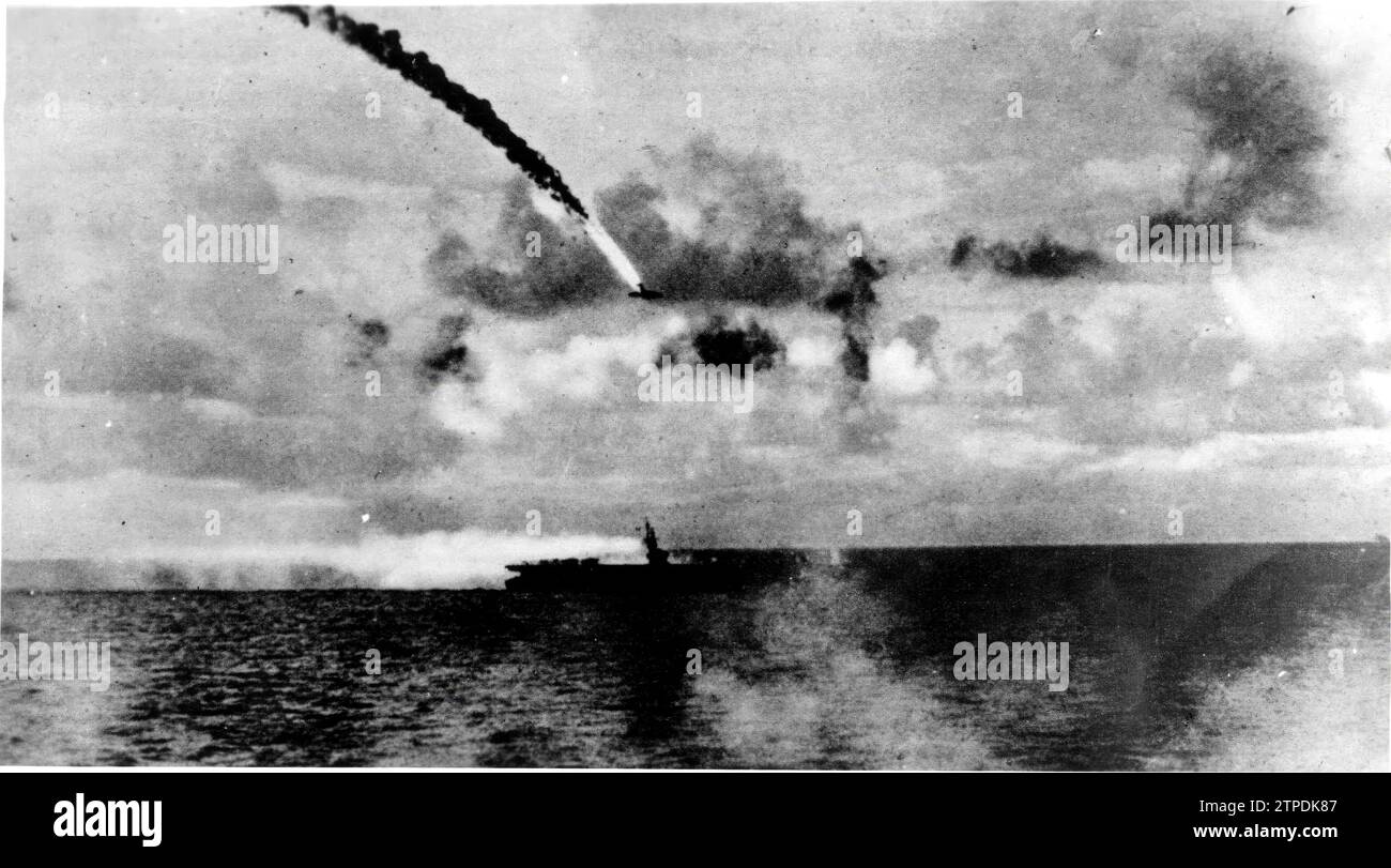 12/31/1944. Naval air battle in the Pacific. A Japanese plane is launched against a North American navy unit, on whose deck it explodes. Credit: Album / Archivo ABC / Orbis Stock Photo