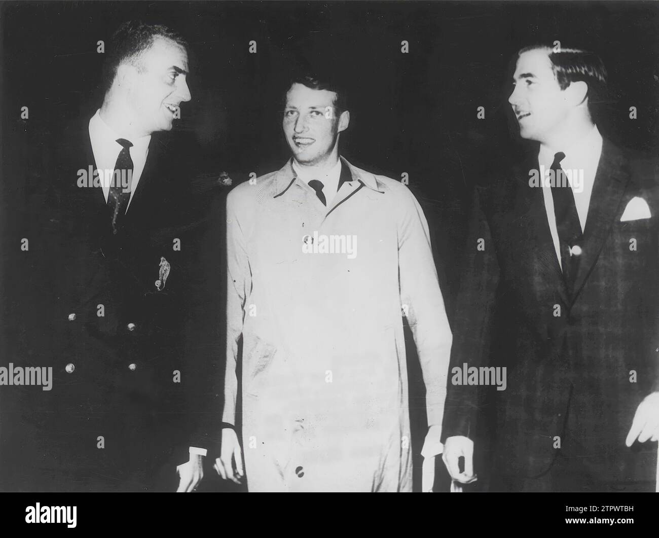 12/31/1961. Prince Juan Carlos of Bourbon and Constantine of Greece, accompany the crown prince of Norway, Harald (in the center) upon his arrival to the Greek capital invited by kings Paul and Federica. Credit: Album / Archivo ABC Stock Photo